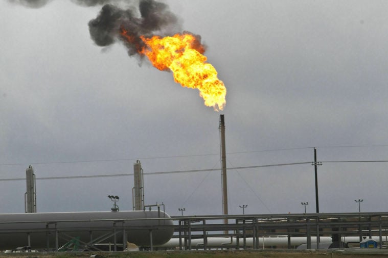 This photo taken in 2015, shows a flare-up at an oil processing plant outside Cuero, Texas in 2015. Researchers from the University of Southern California and San Francisco State University are using satellites to see how much flaring occurs in the region, in addition to data provided by the oil and gas industry. The researchers have counted 43,887 distinct oil and gas flares in the region from 2012 to 2016.