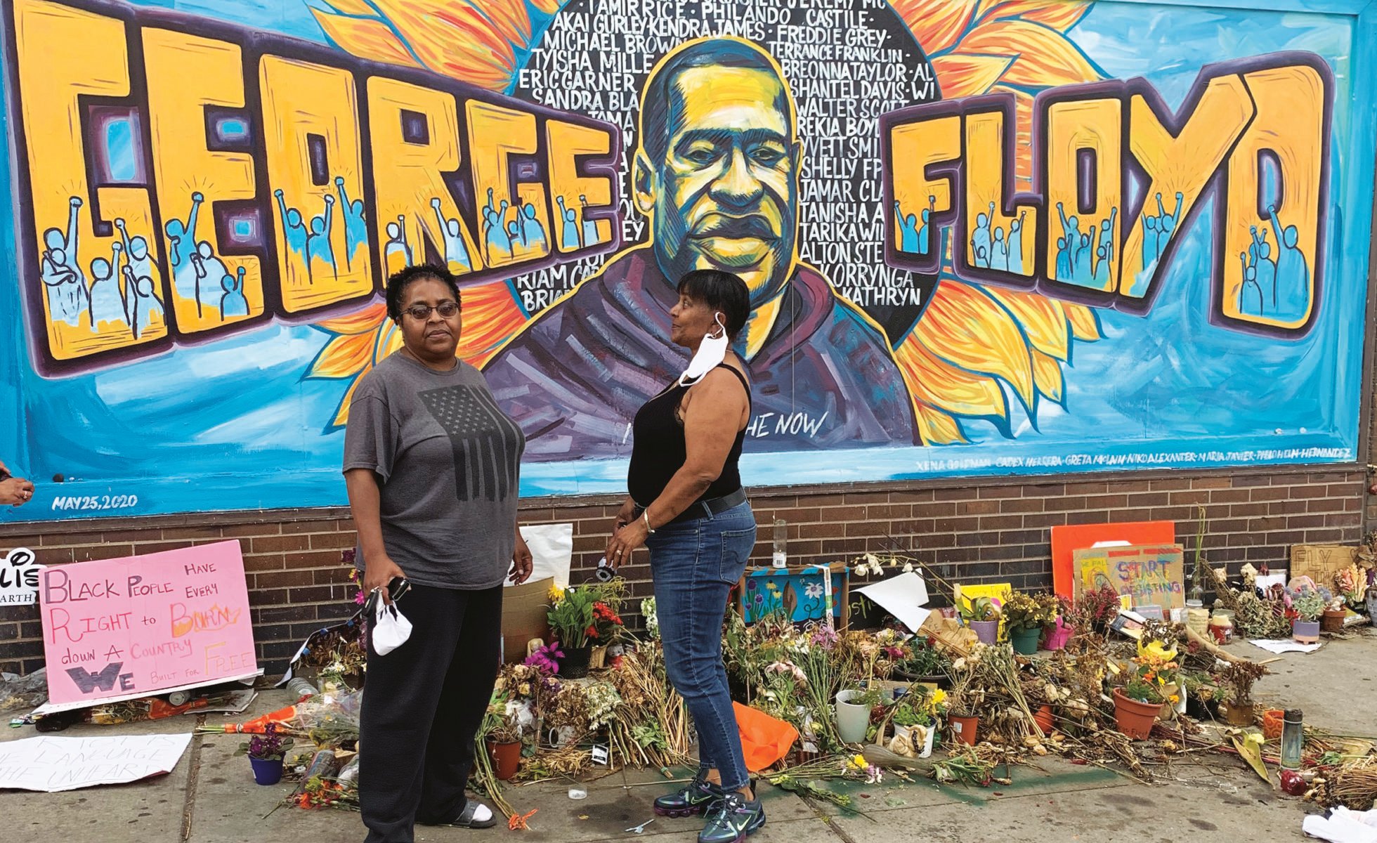Demetria McFarland, left, and her sister drove through the night to visit a memorial for George Floyd in Minneapolis.